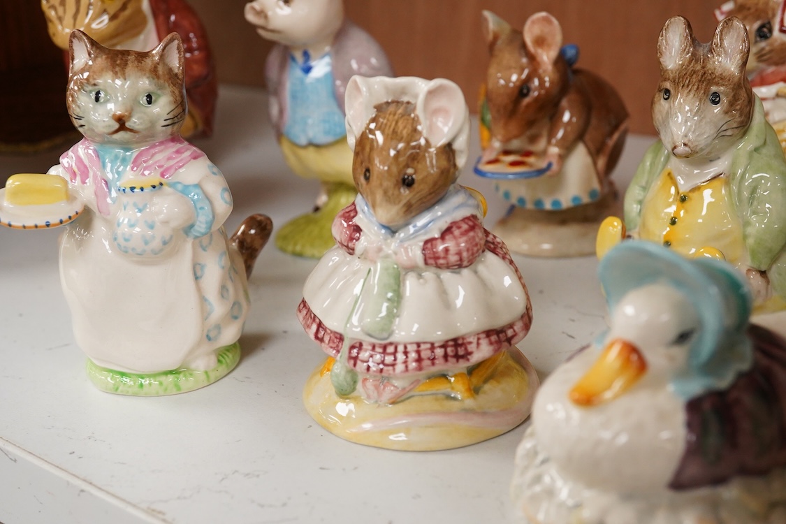 Twenty Beatrix Potter figures, mostly later production figures, largest 11cm high